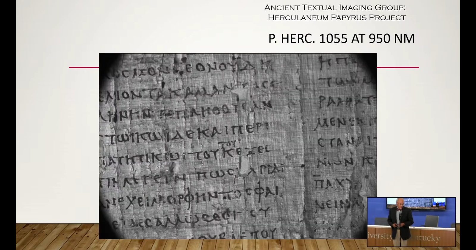 Slide: P. Herc. 1055 at 950 nm. The same fragment, now with clear rows of Greek letters